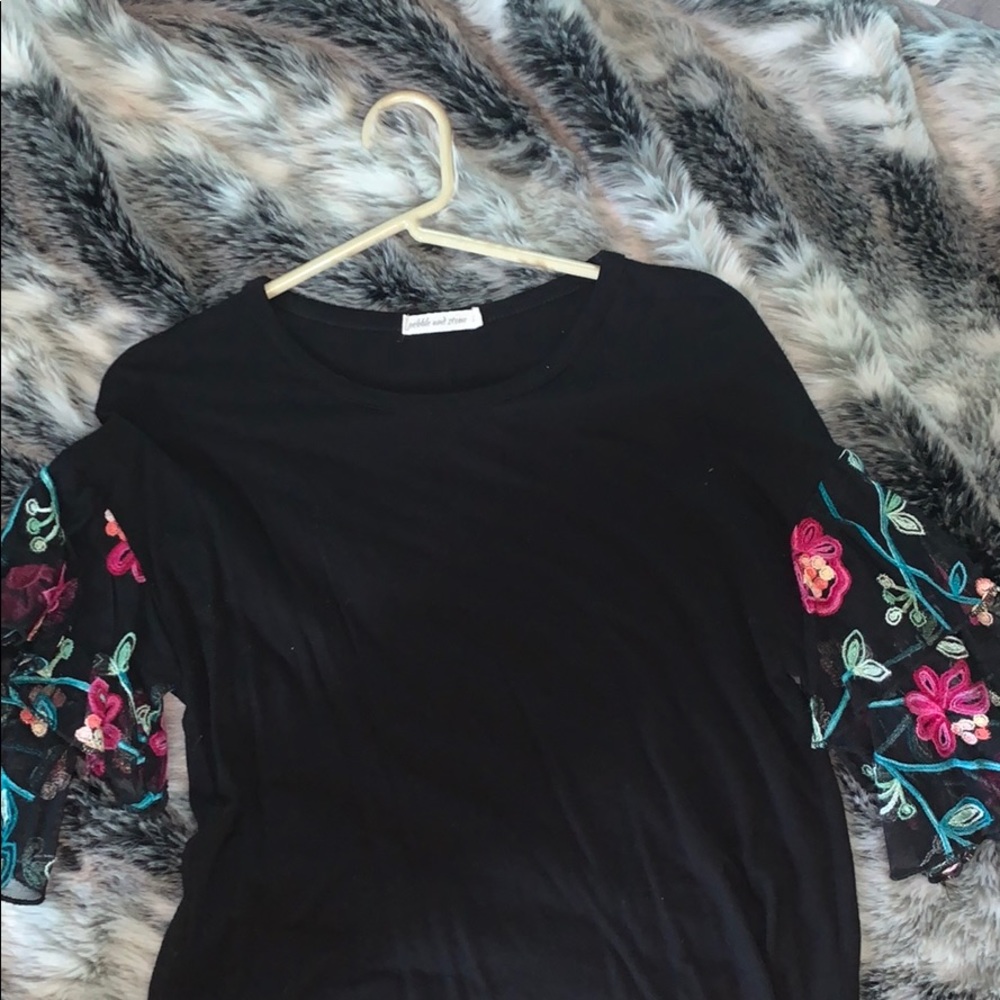 Black blouse with stitched flowers and vines